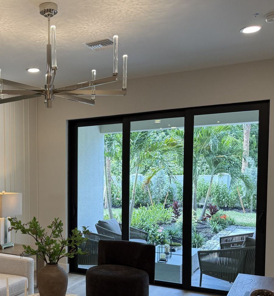 Great room with sliding glass doors opening to the patio