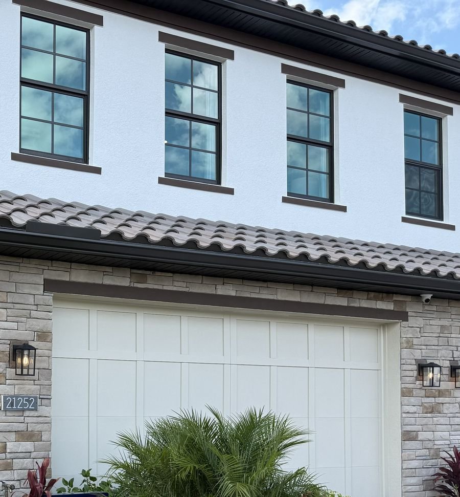 Summercrest townhome exterior with stone accents and tile roof in Estero, FL